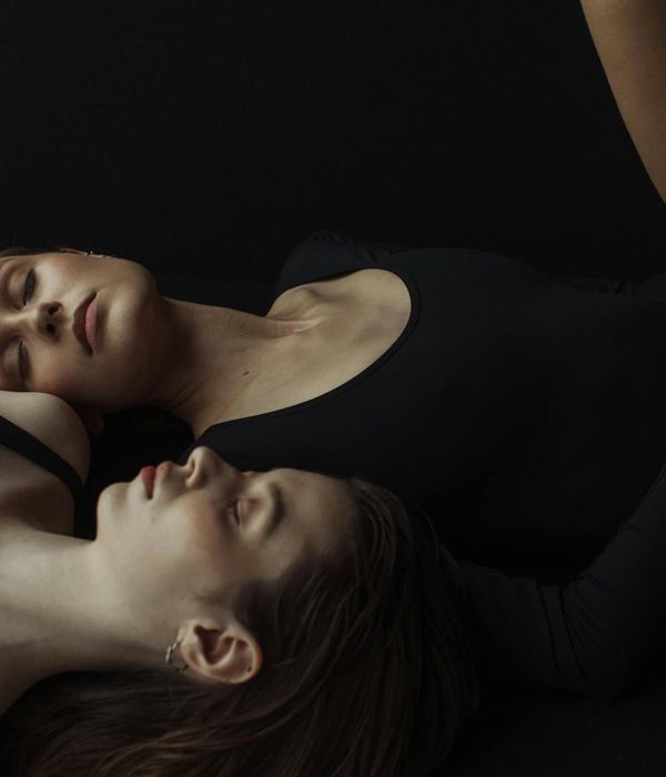 Woman in a graceful yoga pose, embodying balance and tranquility.